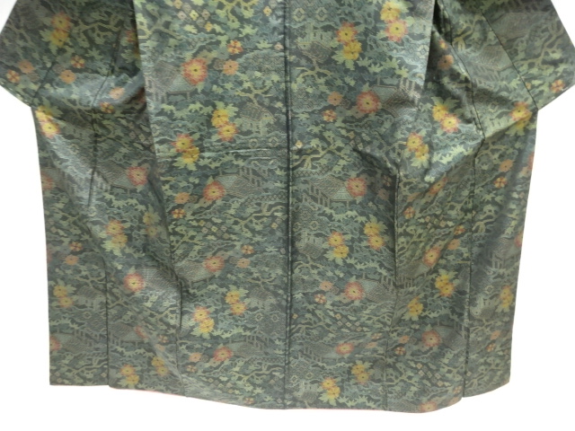  家屋に草花模様織出し本場泥大島紬着物